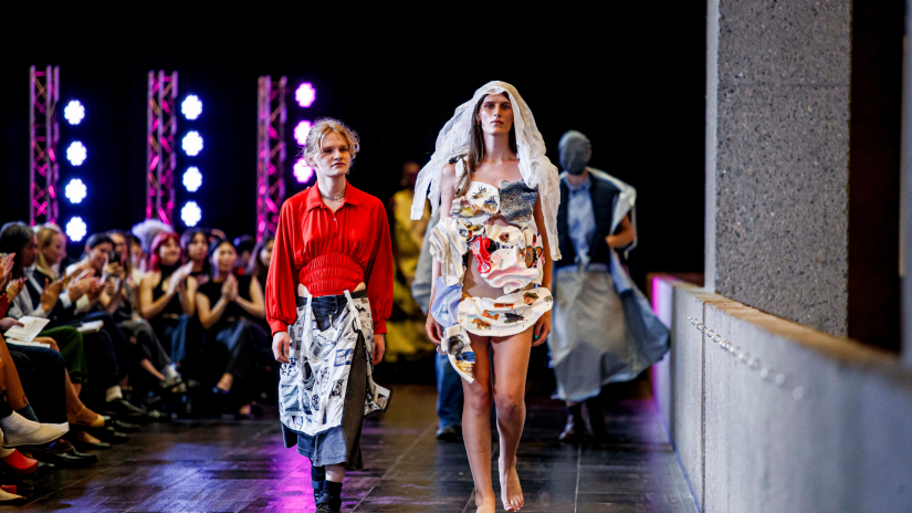 Bridget Matison walks the runway with model wearing one of her designs