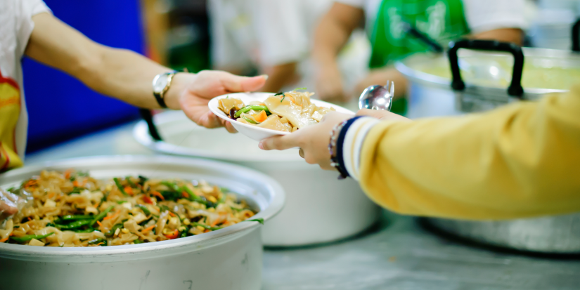 Feeding Food To Poor, Using leftovers to feed the hungry : concept serving free food to the poor