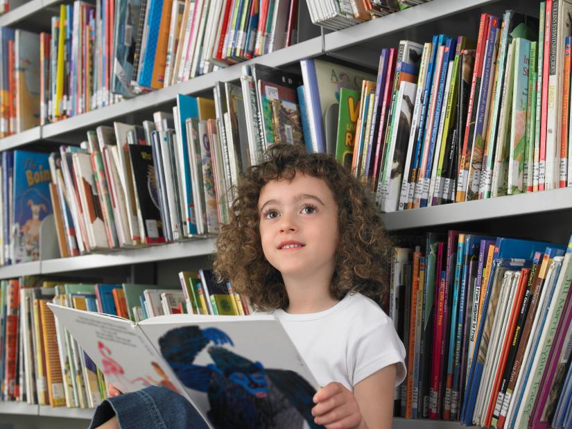 A female child student in a school library