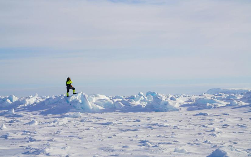 A lone figure in the middle distance in a polar landscape. Picture: Rebecca Duncan
