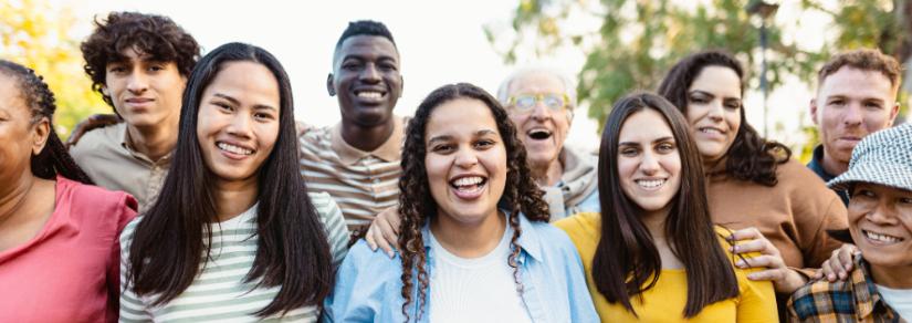 People with different ethnicities having fun in a park. Adobe Stock