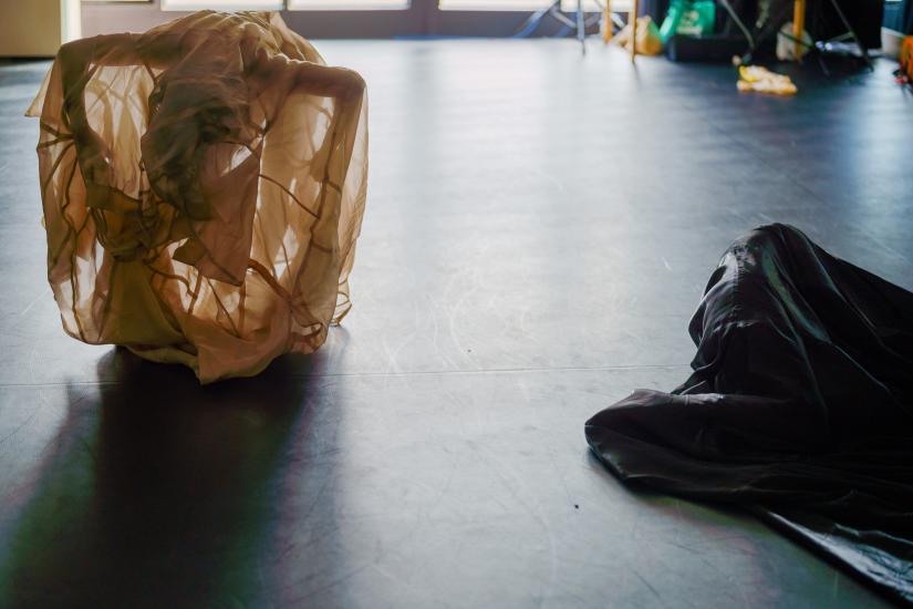 two dancers on a rehersal stage