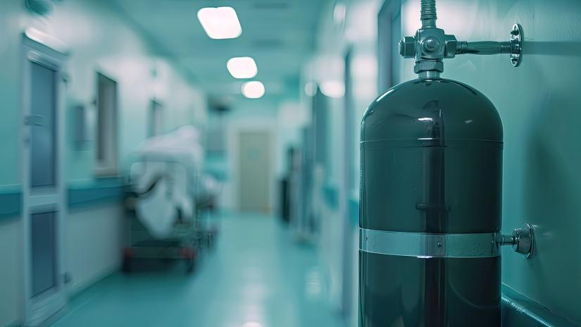 An oxygen tank in a hospital corridor