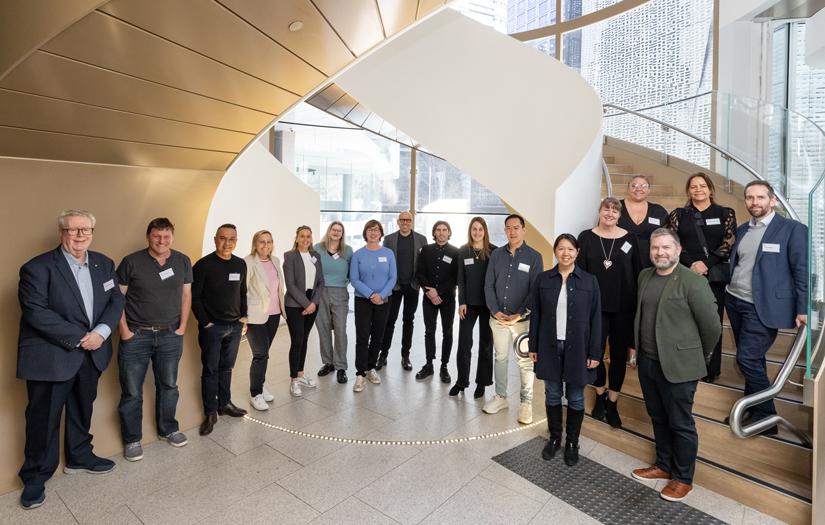 Group of Alumni ambassadors in the building 2 double helix staircase