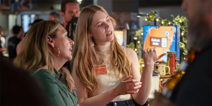 A student and participant interacting at an Animal Logic Academy Open Studio session