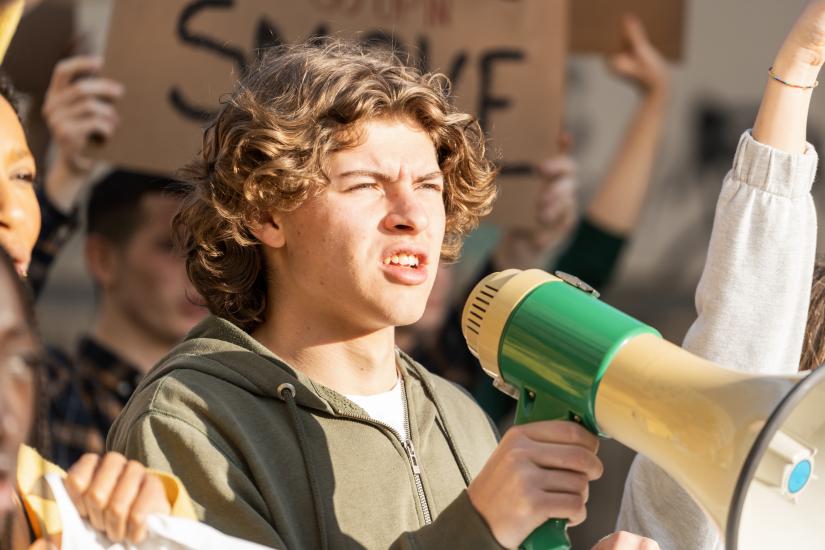 Young person with a megaphone