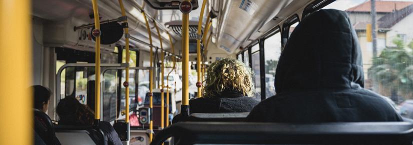 View from the back of passengers travelling on a Sydney bus