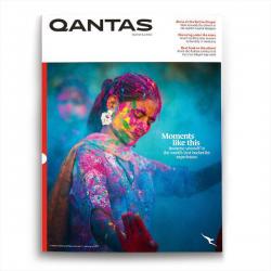Cover of Qantas magazine depicting a woman dancing during a festival