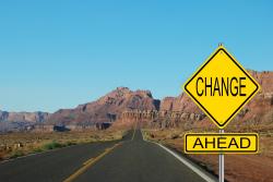 A road sign that says change ahead