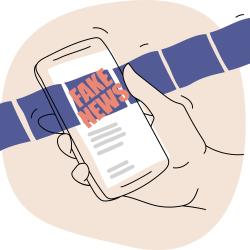 A hand holding phone with words 'Fake News' emblazoned upon it