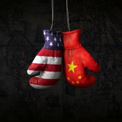 Image of boxing gloves one with US, one with Chinese flag