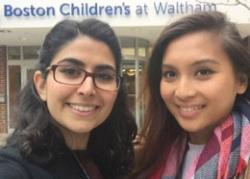 Photo portrait of two UTS Orthoptics students in front of Boston Children's Hospital