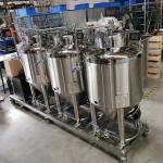 Three chrome kegs of the Nano Brewery at the Centre for Advanced Manufacturing